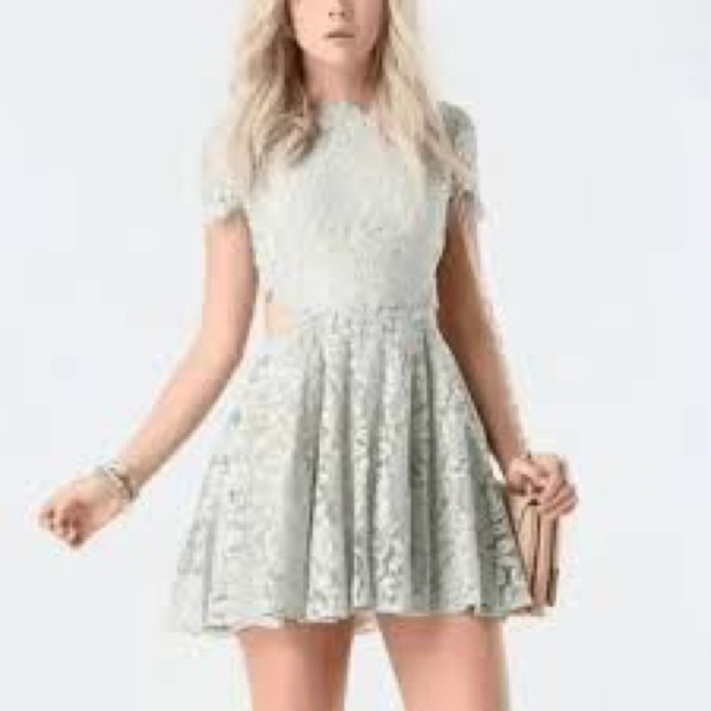 Bebe: sea blue green lace peak a boo waist cap sleeve dress size 2